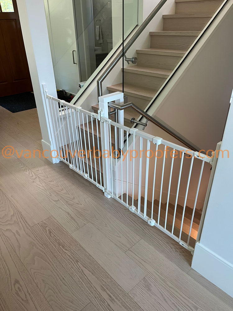 Wood banisters & no-hole clamps installation by Vancouver Baby Proofers